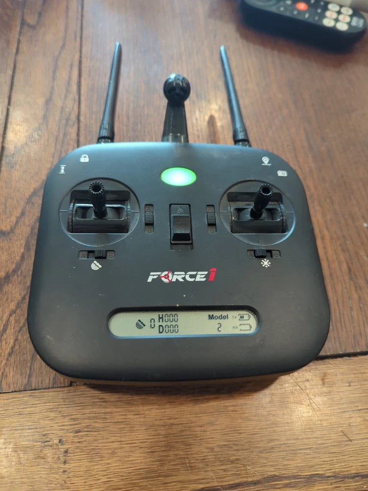 Drone remote controller with two antennas, control sticks, buttons, and Force1 logo