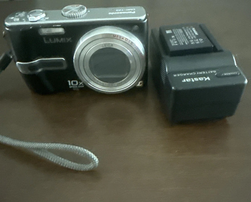 Purple And Pixelated Screen  LUMIX DMC-TZ3 7.2 With Charger And  Battery