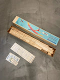 Vintage sailplane glider kit box with wooden fuselage parts and instruction sheets
