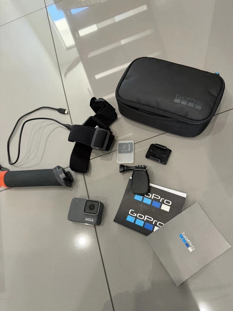 GoPro HERO 7 silver action camera kit with mounts, case, and accessories