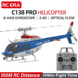 RC helicopter with blue fuselage, red rotor mast, tail rotor, and gray 2.4G remote controller