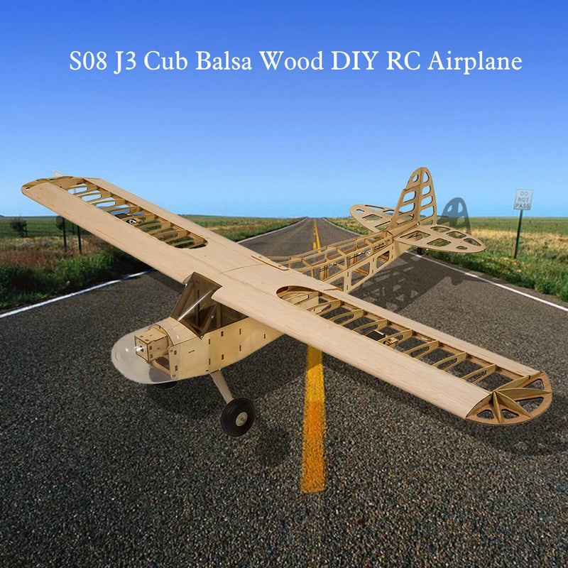 Balsa wood RC airplane model with propeller, landing gear, Piper J-3 Cub style
