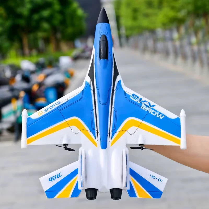 Blue and white RC glider aircraft with three fins and front landing gear