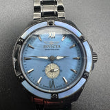 Invicta wristwatch with black strap, silver case, blue dial, Roman numerals