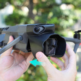 Drone gimbal lens hood sunshade protector, black cover over camera on front
