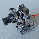 2-axis FPV gimbal with metal servos, black camera mount, and visible wiring