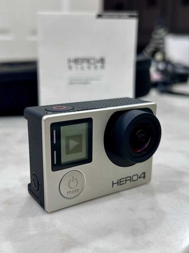 GoPro HERO4 Silver action camera with front lens and touchscreen display