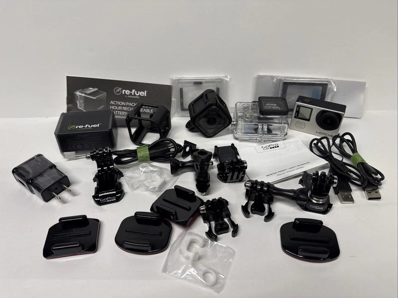 GoPro HERO4 Session/Silver action camera with multiple mounts, cases, and cords