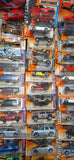 Assorted Matchbox vintage-style toy car blister packs, various colors, multiple models