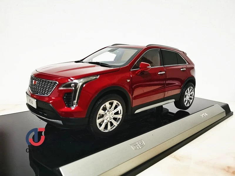 Red 1:18 scale alloy car model of the XT4 2022, front three-quarter view