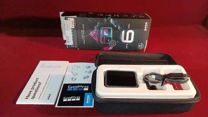 GoPro HERO9 Black action camera with case and mounting accessories