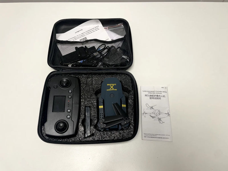 Slightly used drone kit in zip case with controller, drone, and instruction manual