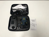 Slightly used drone kit in zip case with controller, drone, and instruction manual