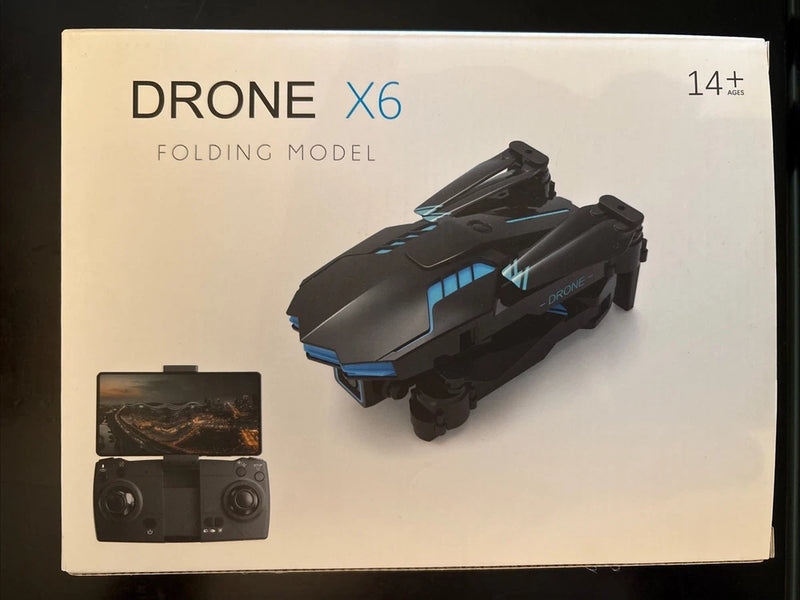 Folding model drone box with illustrated drone and controller