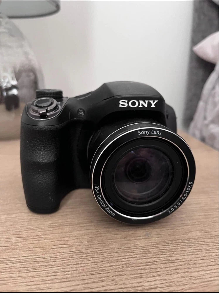 SONY digital camera with 35x optical zoom lens, black body
