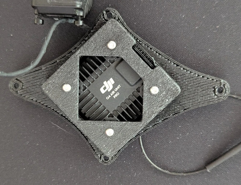 Carbon fiber VTX mount plate with DJI module, four screw corners