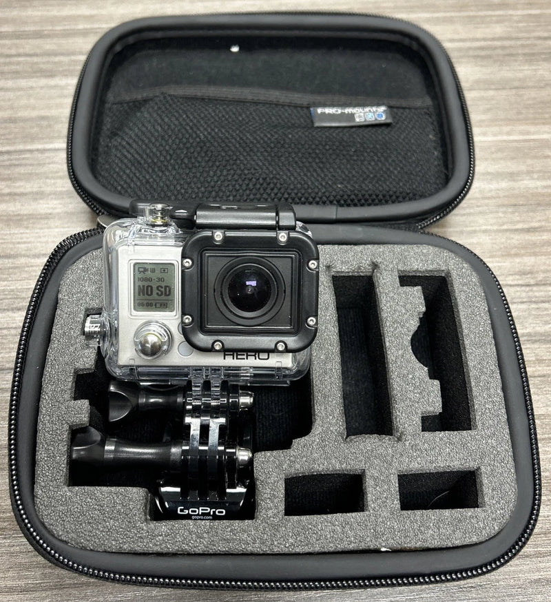 GoPro HERO3 White Edition action camera with lens and mounts in padded case