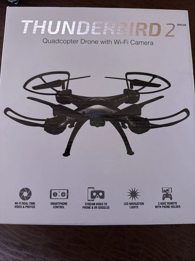 Quadcopter drone with Wi‑Fi camera shown on retail box front