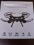 Quadcopter drone with Wi‑Fi camera shown on retail box front