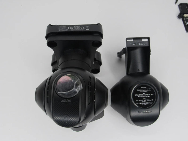 Black 3-axis gimbal 4K camera with front lens and side control module