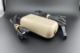 Nintendo Game Boy AC adapter with beige power brick and attached cable