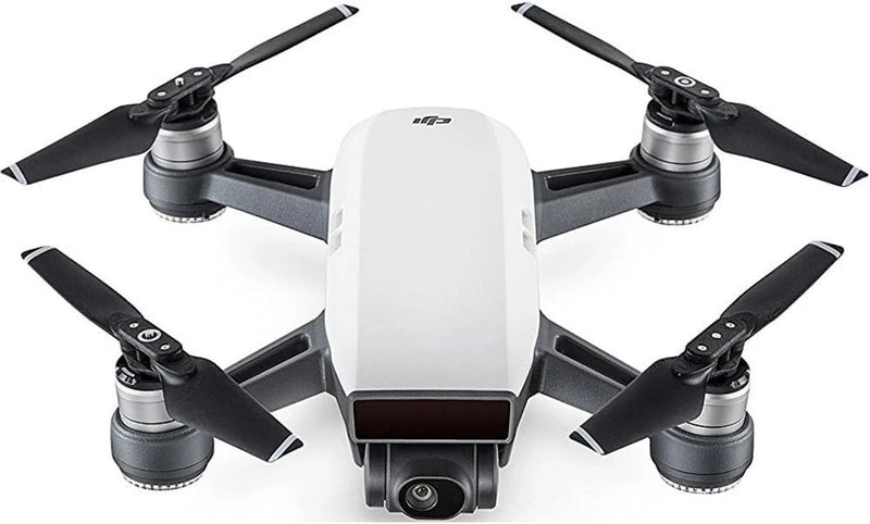 White portable mini drone with four folded propellers and front camera lens