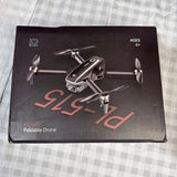 Foldable drone packaging showing black quadcopter with propellers and LED lights