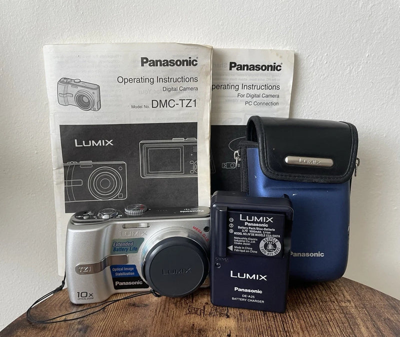 Panasonic LUMIX DMC-TZ1 Silver Digital Camera Works with Flaws - AS IS Read