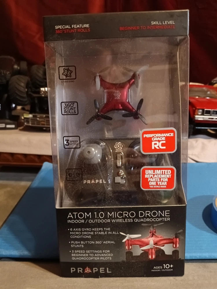 Red Propel Atom 1.0 micro wireless quadcopter drone in retail box packaging