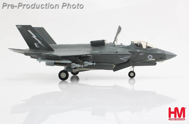 Dark gray F-35B model jet aircraft with landing gear, side view on display