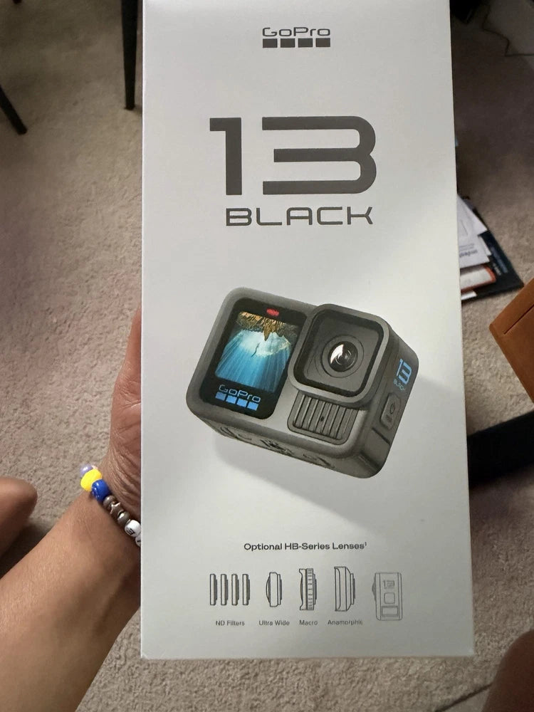 GoPro HERO13 Black action camera box with camera and waterproof housing shown