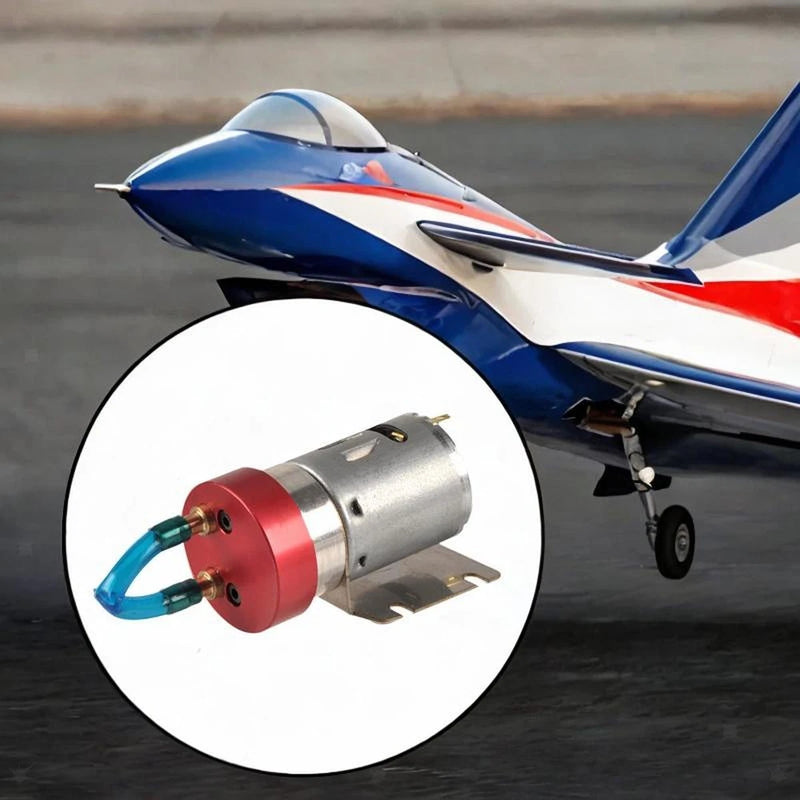 Electric oil transfer pump with silver motor, red housing, and blue inlet hose