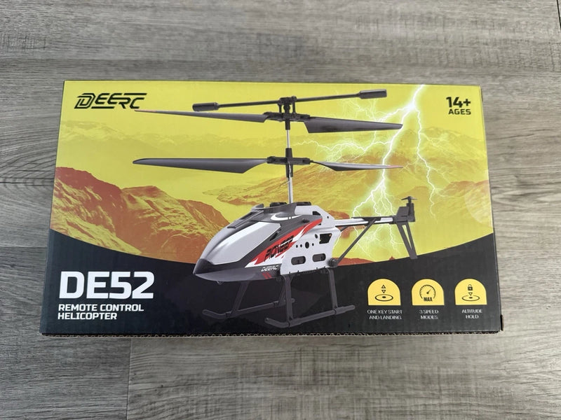 DEERC DE52 remote control helicopter scale model box with white and red helicopter