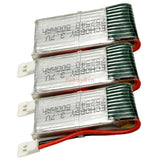 Three-cell LiPo battery pack with green heat-shrink, red leads, and white connector plugs