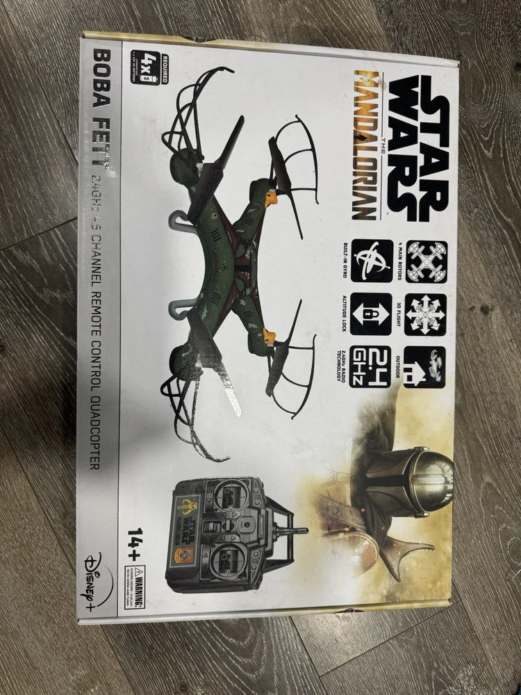 RC quadcopter drone box with illustrated flying drone and handheld controller