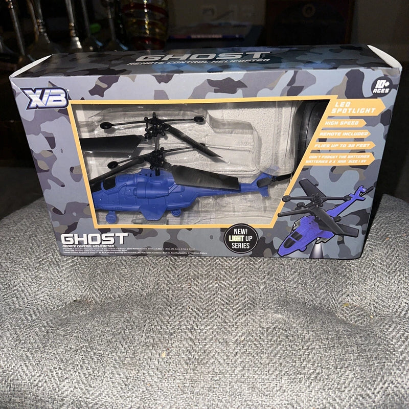 Blue remote control ghost helicopter flying toy in retail box