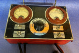 NICE United Motors battery tester meter with dual analog gauges and center switch