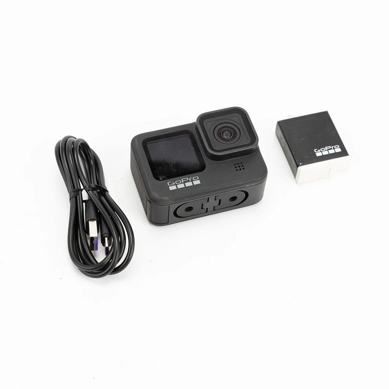 GoPro HERO9 Black action camera with USB cable and microSD card