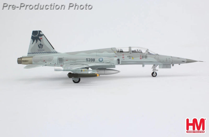 Gray F-5F fighter jet model with landing gear down, side view