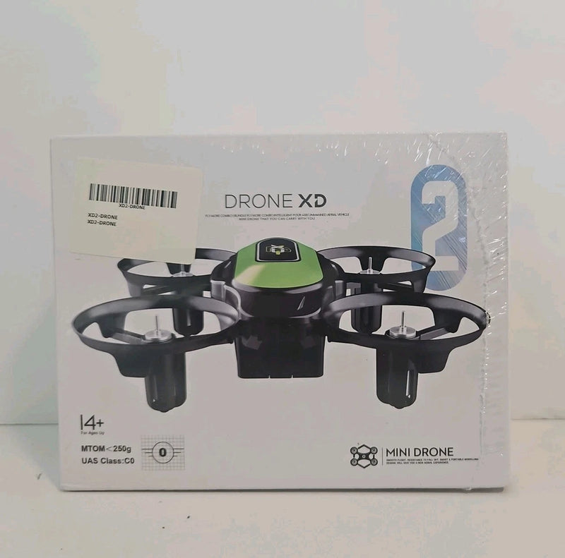 Mini FPV quadcopter drone in retail box, black frame with four propellers