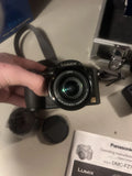 Panasonic Lumix DMC-FZ7 Bridge Digital Camera 12x Optical Zoom Black + Accessor¡­