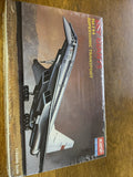 Scale aircraft model kit box with large Tu-144-style jet illustration in white and gray