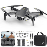Compact quadcopter drone with camera, prop guards, remote controller and bag
