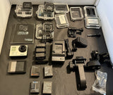 GoPro Hero3 action camera kit with head mount, waterproof housing, multiple batteries