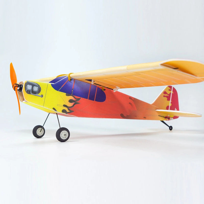RC PP foam airplane with yellow nose and orange, blue, red wings, with 2 wheels