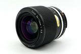 Nikon 36-72mm manual focus zoom lens, black textured grip and front glass.