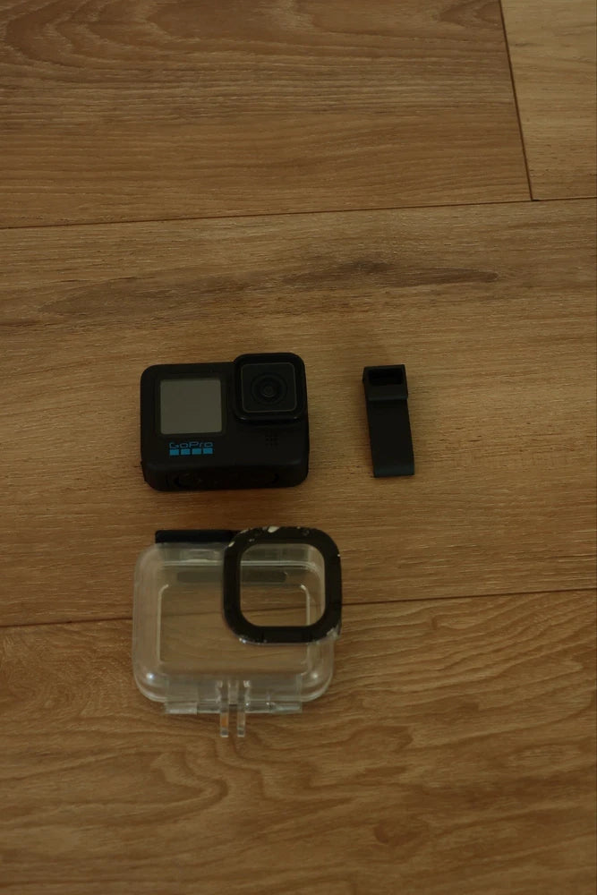 GoPro HERO11 Black action camera with touchscreen and waterproof housing plus mounting strap