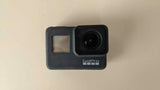 GoPro HERO7 Black action camera with front lens and status screen