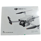 DJI Mini 3 Pro drone with four propellers, white body