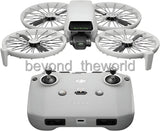 Foldable quadcopter drone with controller, front view, gray body and camera module